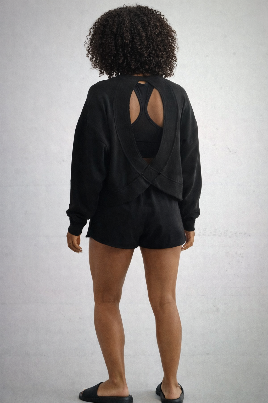 Woman's Black Open Back Tee