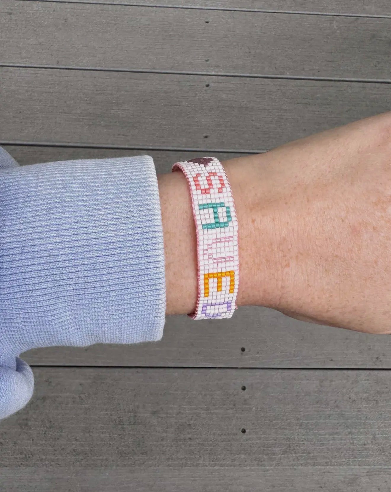 Saved Micro Bead String Bracelet